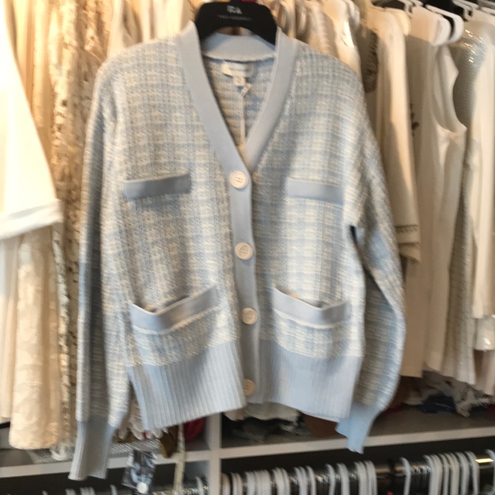 Button front sweater.